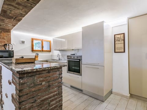 Flooring, Kitchen, Interior Design, Countertop, Wood, Ceiling, Furniture, Floor, Room, Cabinetry