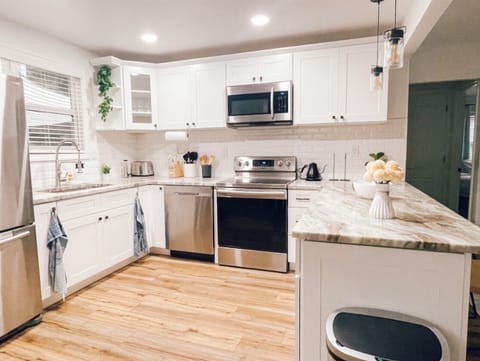 Cook for everyone in this fully stocked gourmet kitchen