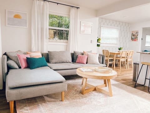 Open concept living room that opens to the dining room and kitchen. 