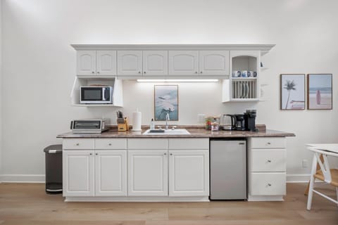Modern kitchen with sleek mini fridge