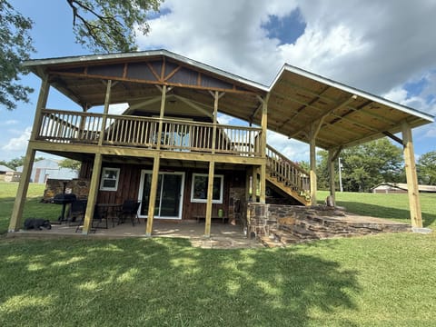 Enjoy a cup of coffee on the covered deck and patio. 
