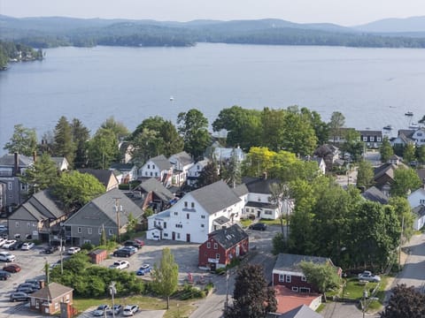 Stunning aerial view of Lake Winnipesaukee and charming Wolfeboro downtown — steps from shops & dining.”
