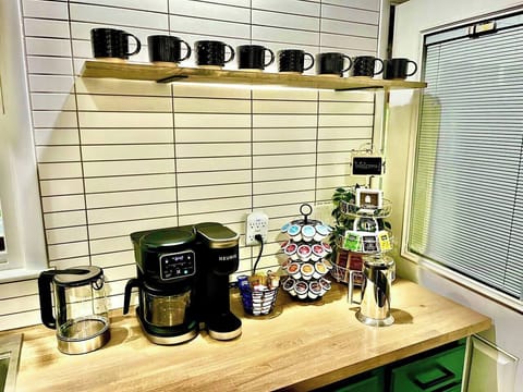 We provide a selection of coffee blends, including decaf, teas, and a kettle.