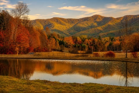 Reflecting on the stillness, where water meets mountain light.