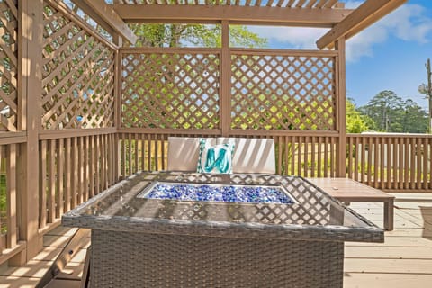 Sip your morning coffee under the pergola while sunlight filters through—your private outdoor retreat awaits.