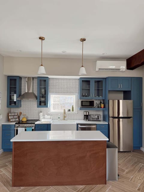 Second Floor: Fully renovated kitchen with brand new appliances (Coffee, powdered creamer, sugar, salt & pepper, spices and oil provided) Mini split providing heat/AC, provides control for the entire open space.