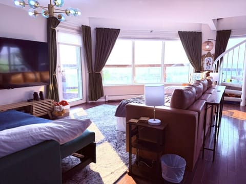 Wake up and enjoy your coffee to a stunning view of the Aerial Lift Bridge.