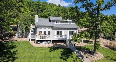 Gently sloped lot has only 8 steps to lake.  Grassy area for child play