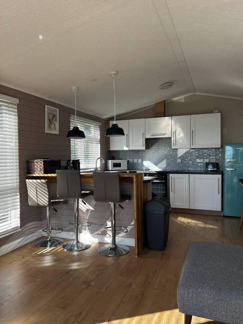 Our modern kitchen has everything you need, from a coffee machine to a dishwasher for easy clean up.