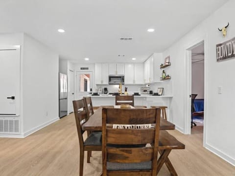 Open dining + kitchen layout perfect for meals and gatherings