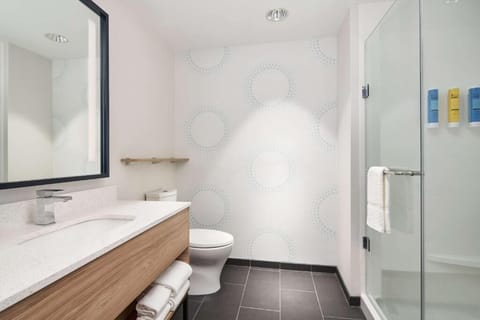 Full bathroom with a shower. Basic toiletries and towels are provided