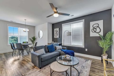 This living room invites you to relax with loved ones, whether you're sharing stories or watching your favorite movie in total comfort.