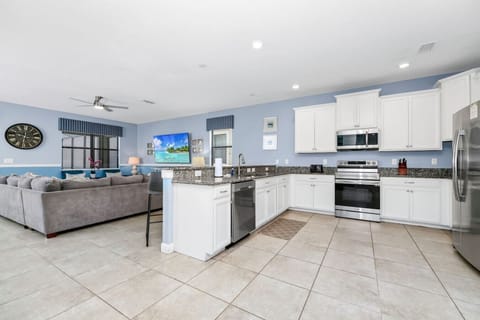 Cook with ease in the fully equipped kitchen—complete with modern appliances, cookware, and plenty of space.