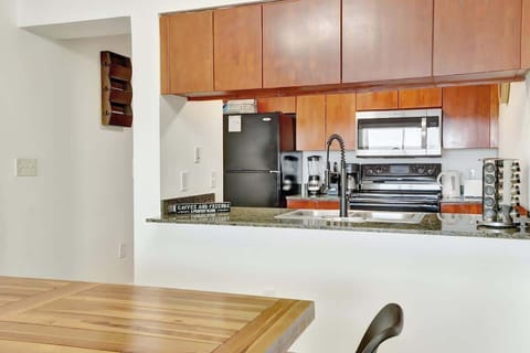 Kitchen stocked with all essential cookware and utensils.