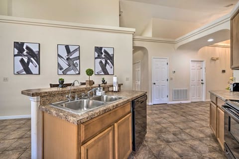 Whip up your favorites in a fully stocked kitchen featuring modern appliances and all the essentials.