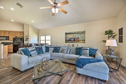 Relax in a spacious living room with plush seating and a smart TV for all your entertainment needs.