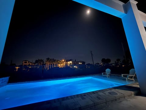 Private evening pool deck offering a serene outdoor atmosphere.