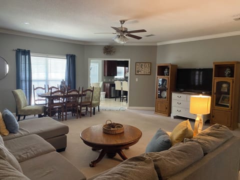 Living room and formal dining room just as you walk through the front door.