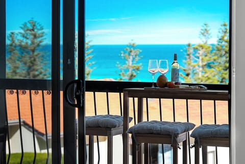 Soak up the sun and sea breeze on your private balcony