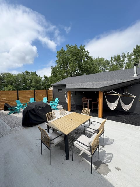 Patio dining, hammock swings, gas grill and gas fire pit.