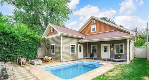 Private backyard pool surrounded by patio space for sunny swims & relaxing afternoons