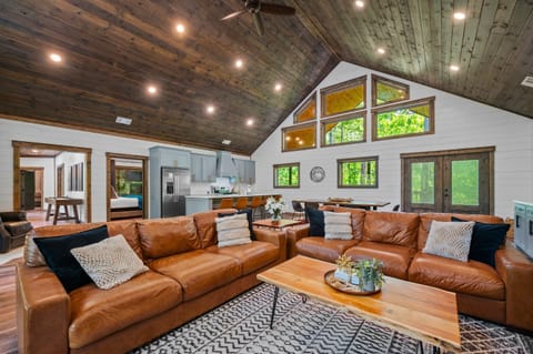 Living Room: Bright and spacious with panoramic views, perfect for gathering and unwinding together!