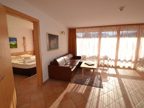 Pluto - Apartments Sonneck Apartment in Salzburgerland