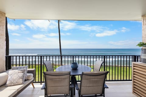 Breathtaking oceanfront views stretch endlessly from your private balcony, where morning coffee and evening sunsets become daily rituals with the sound of waves below.