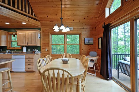 dining area overlooks the deck and lake