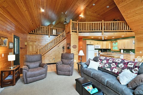 upstairs loft with reading nook, five beds, a work area a lots of family games