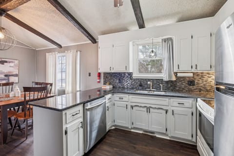 Open concept kitchen with marble counter tops newly renovated