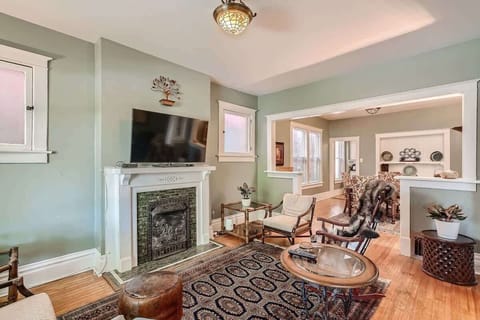 Well-designed open layout connecting the living room and dining area, ideal for both relaxation and entertaining guests.