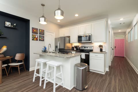 Fully stocked kitchen, island with seating for 2.