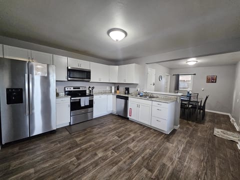 The kitchen is large and open- but the kids (whether they have 2 or 4 legs) will still find a way to get under foot!