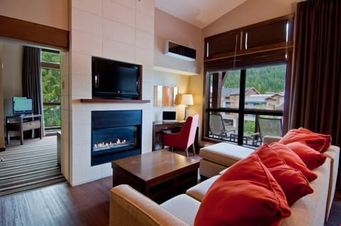 Kick up your feet and relax in front of the fireplace.