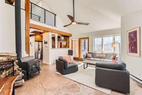 Bright seating area just outside the kitchen, perfect for casual dining, reading, or relaxation