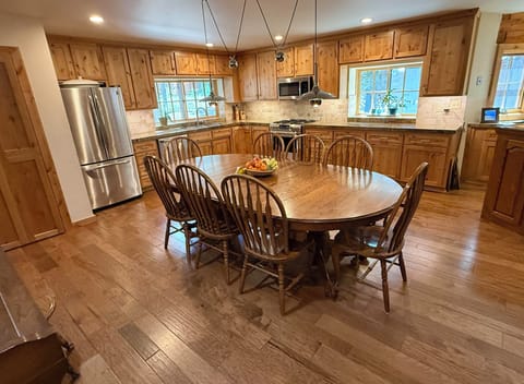 Large eat in kitchen fully stocked for the chef in your group.