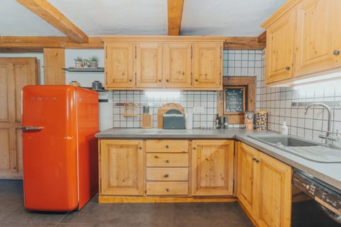 The full kitchen is well equipped, and is separate to the main living area