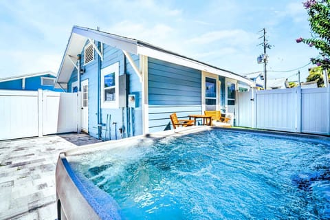 Outdoor Oasis: Soak in the private hot tub or savor sunsets from your patio!