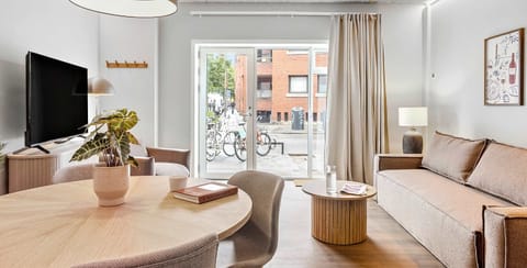 Room view with natural light and both blackout curtains and a thin layer of curtains, to ensure your privacy