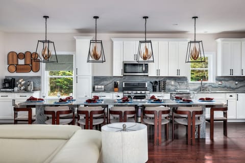 Host your Family Meals in this 12 person Dining Suite. This elegant chef’s kitchen offers the perfect space to come together, preparing favorite meals for any occasion - a casual breakfast or a celebration feast, all in refined, sunlit surroundings.