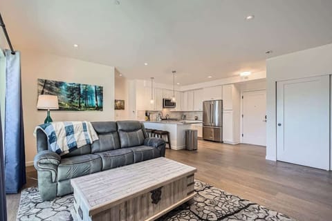 Open entryway leading directly into the kitchen and living room, offering a spacious and welcoming layout