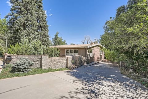 Private driveway with easy access to secure front yard that leads to the main entrance