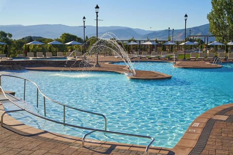 Unwind beside shimmering blue water with plenty of seating