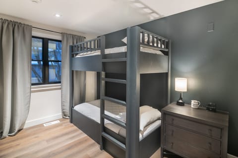 Tuck in the kids with cozy bunks and blackout drapes.