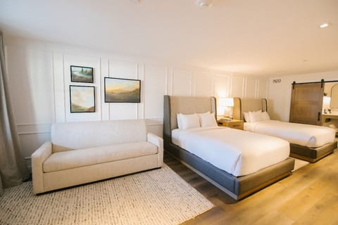 Stretch out in a spacious suite with cozy sofa seating.