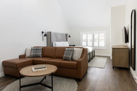 Spread out in a bright suite with lounge seating and space.