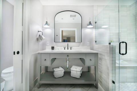 Unwind with spa-like lighting and a roomy double vanity.