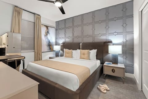 Sink into a luxurious bed framed by elegant geometric design.