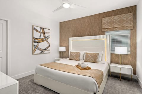 Relax beneath soft lighting in a warm, modern retreat.